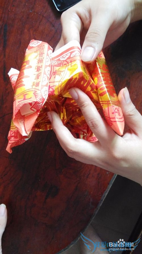 如何折四通佛冠